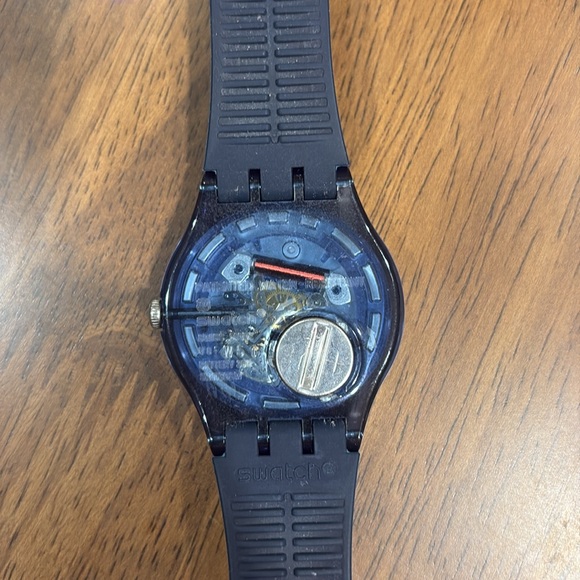 Navy Swatch Watch with navy circle sparkle on watch face. - Picture 3 of 4